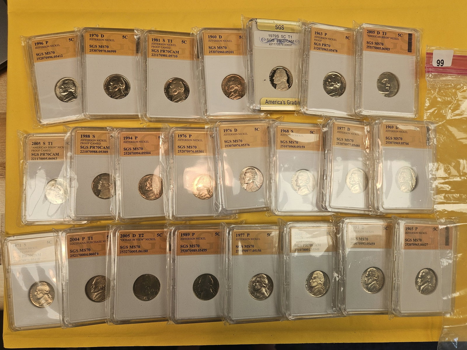 Twenty-three mixed Jefferson nickels: Nice! All in off-brand slabs
