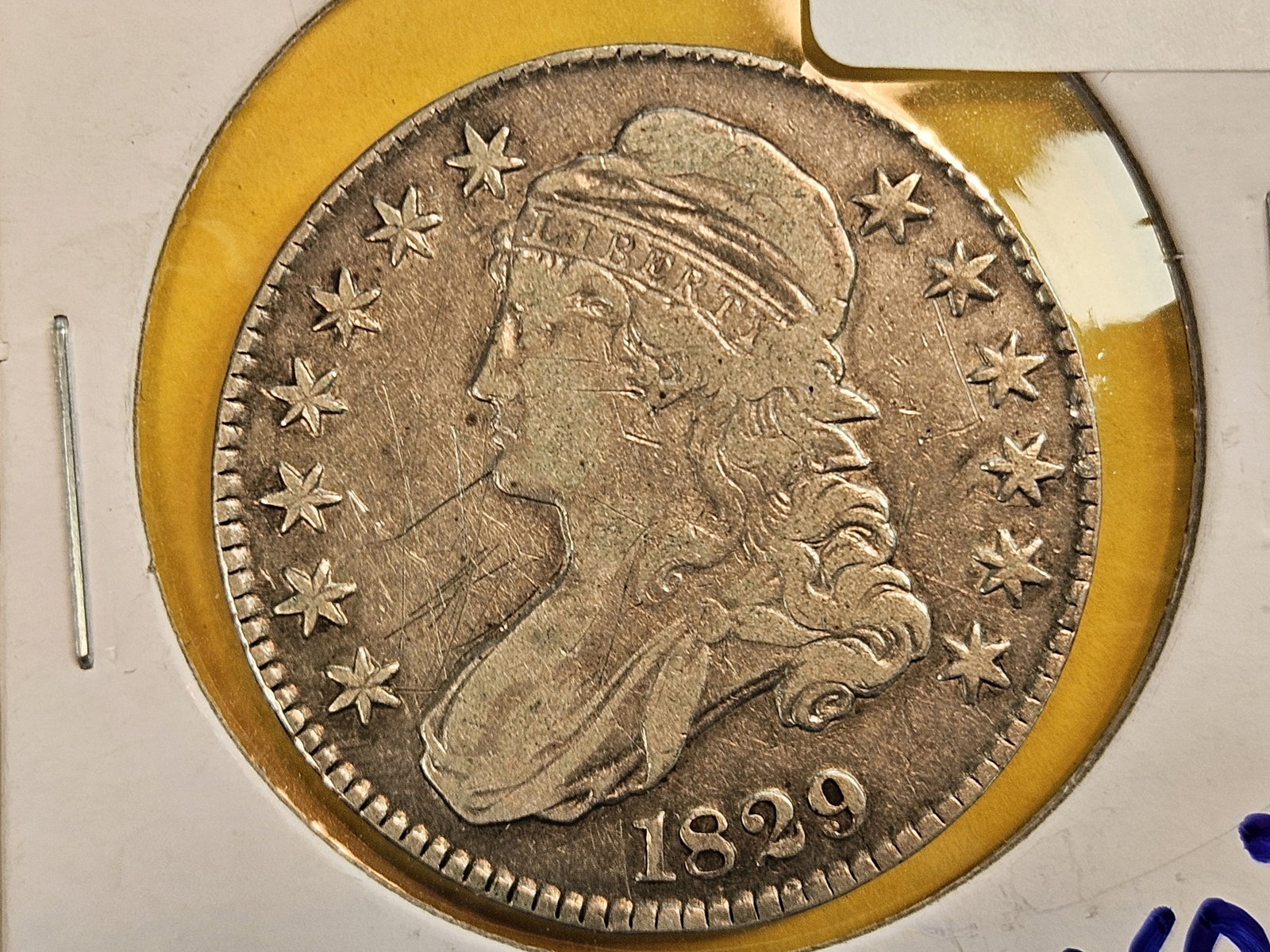1829 Capped Bust silver Half Dollar: Grafitti