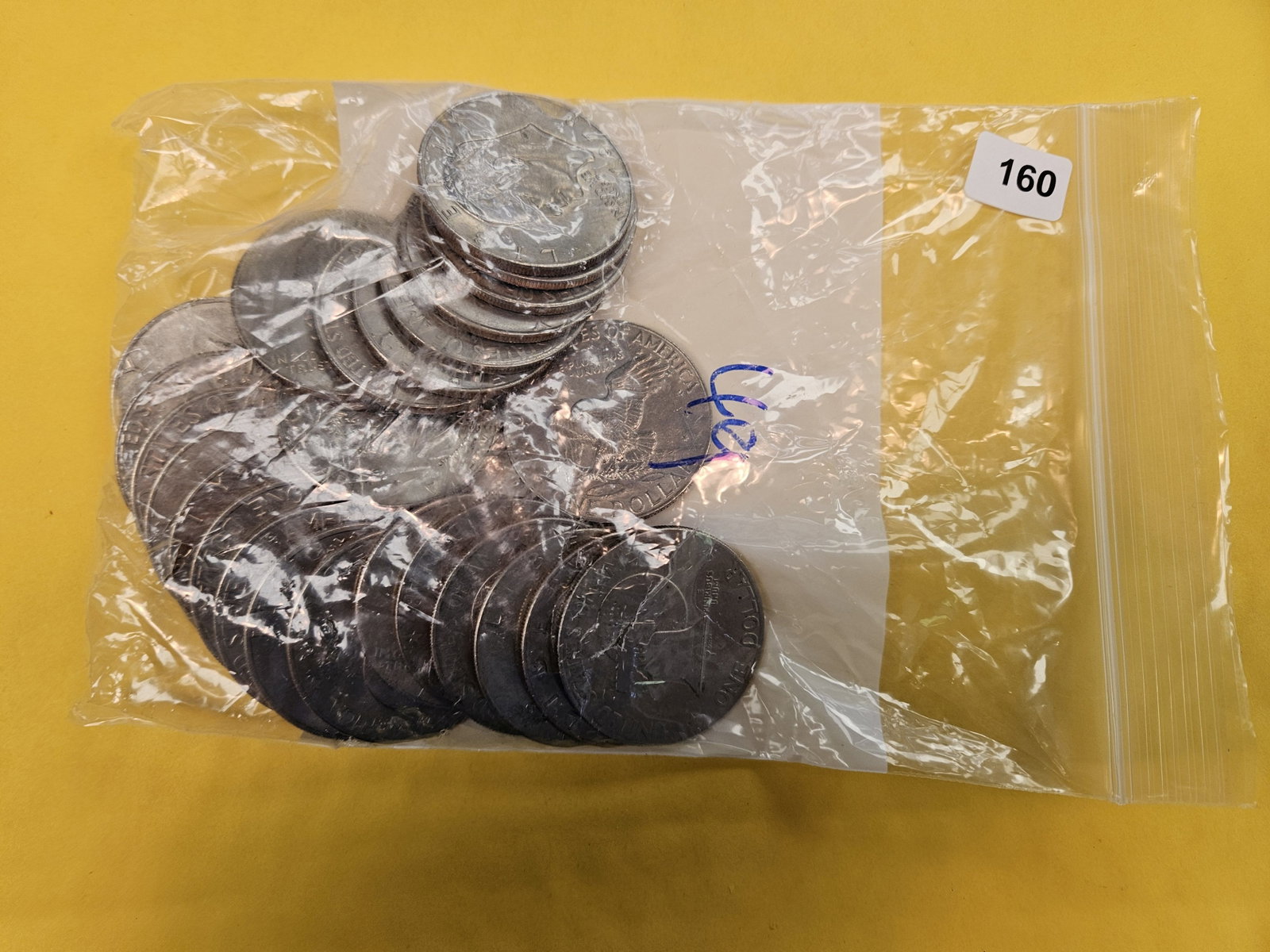 Twenty-five Eisenhower Dollars (1 of 1)