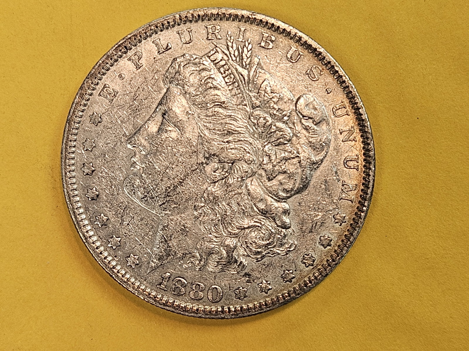 Variety! 1880 8/7 Morgan Dollar in About Uncirculated plus: "Spikes over 8. VAM-6. Fivaz-Stanton (NEW): FS-006. Fivaz-Stanton (OLD): FS-003 Diagnostics: