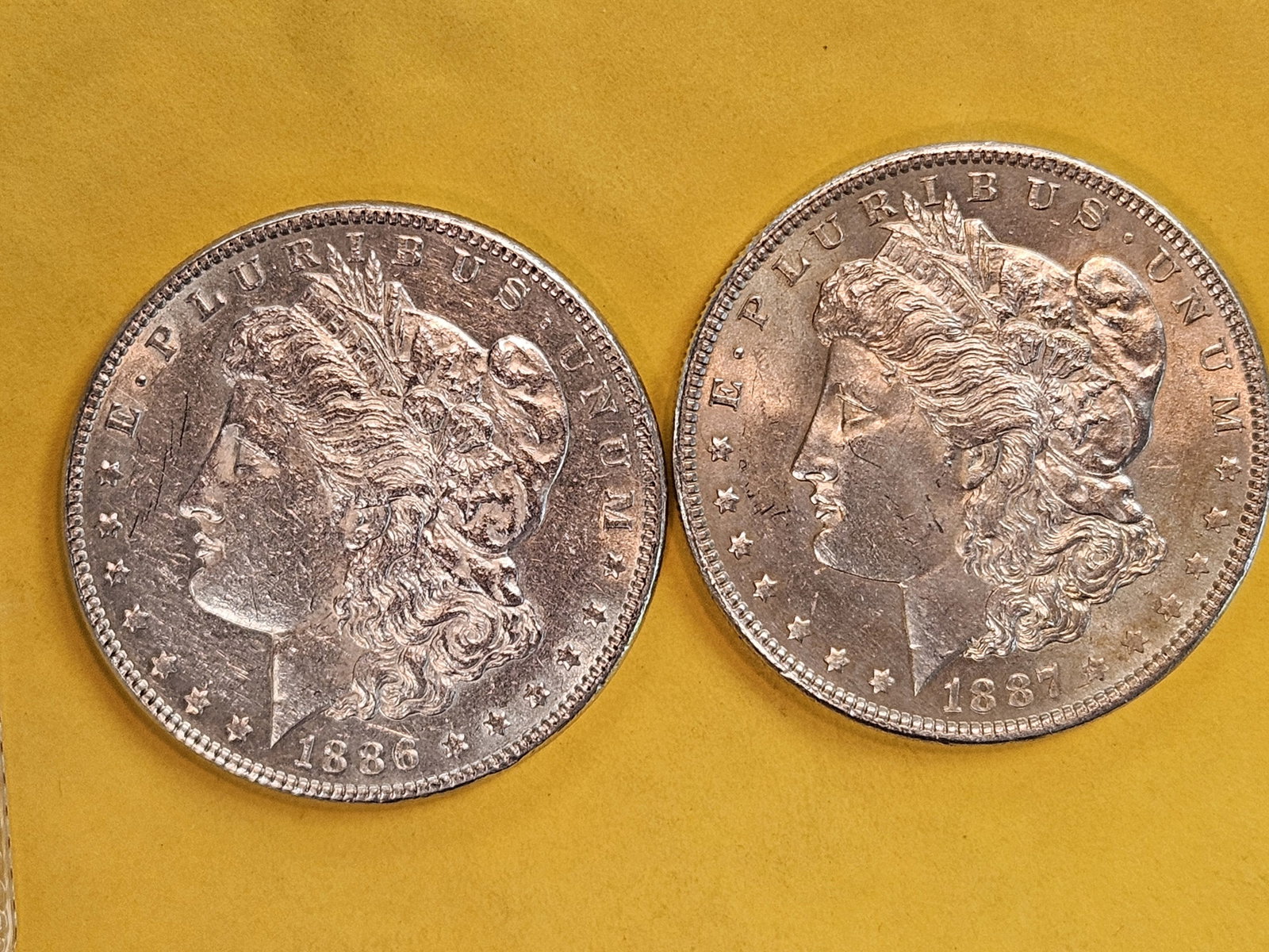 Two Brilliant About Uncirculated Plus Morgan Silver Dollars: 1886 and 1887