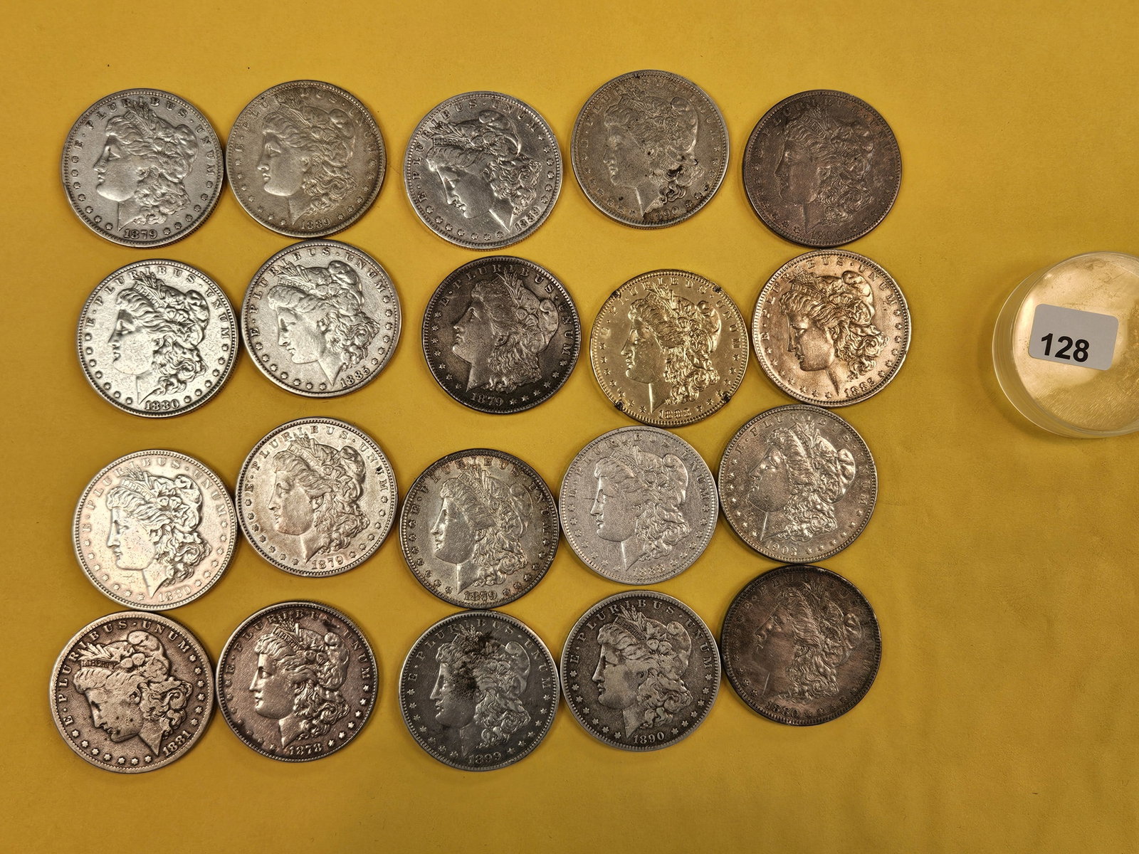 ** FULL ROLL ** Twenty Morgan Silver Dollars: All pre-1904. In Grades from Fine through Brilliant About Uncirculated plus - details