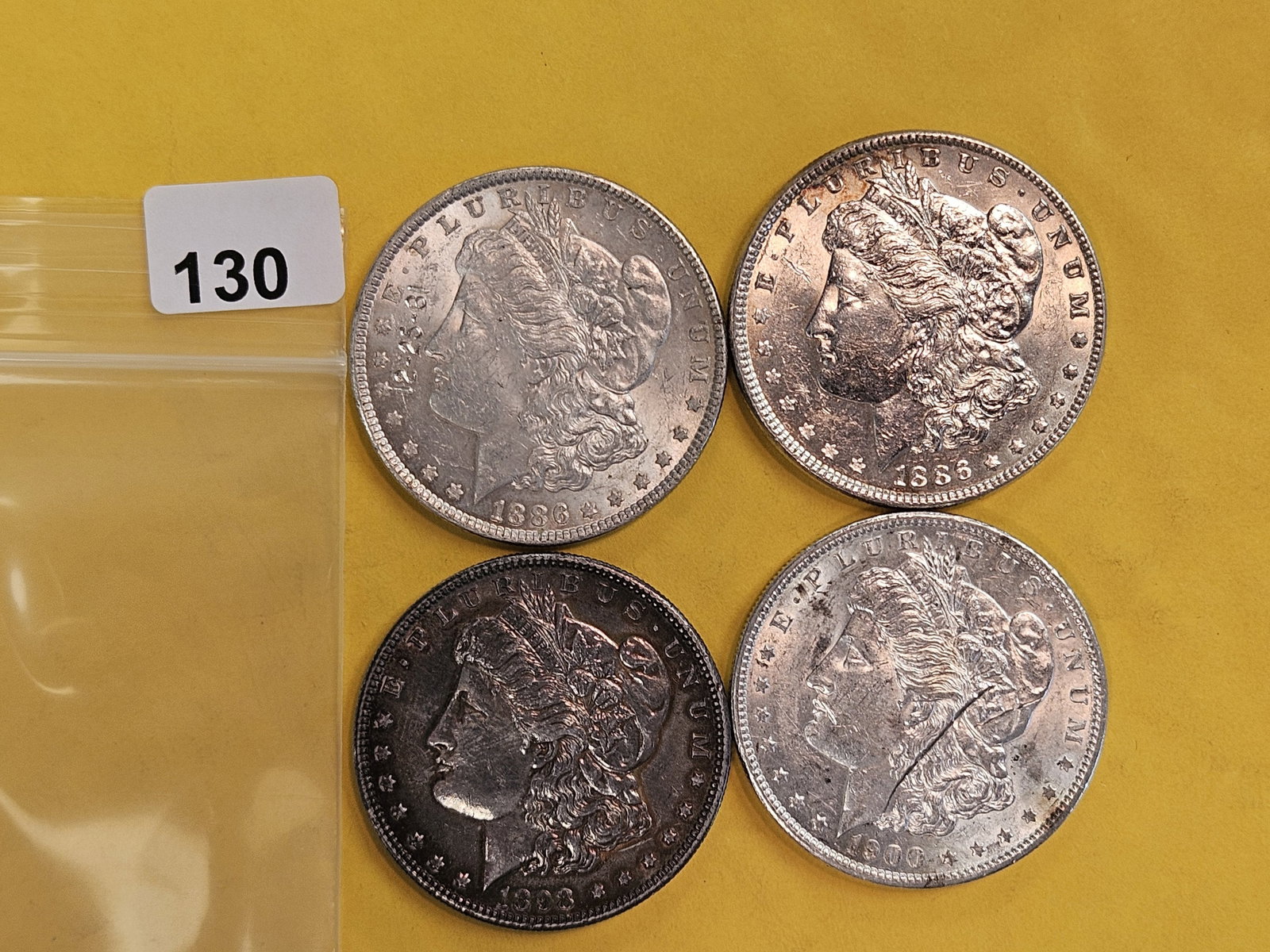 Four Brilliant About Uncirculated plus Morgan Silver Dollars: Mixed. Maybe with light issues