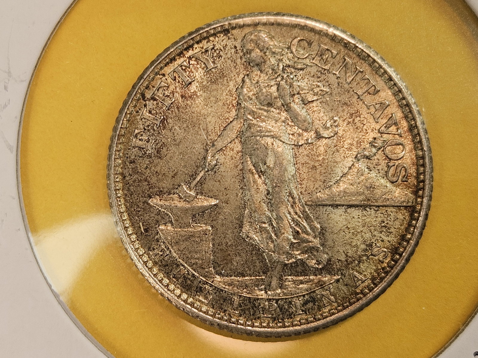 Brilliant AU-UNC 1944 Philippines silver 50 centavos: Toned