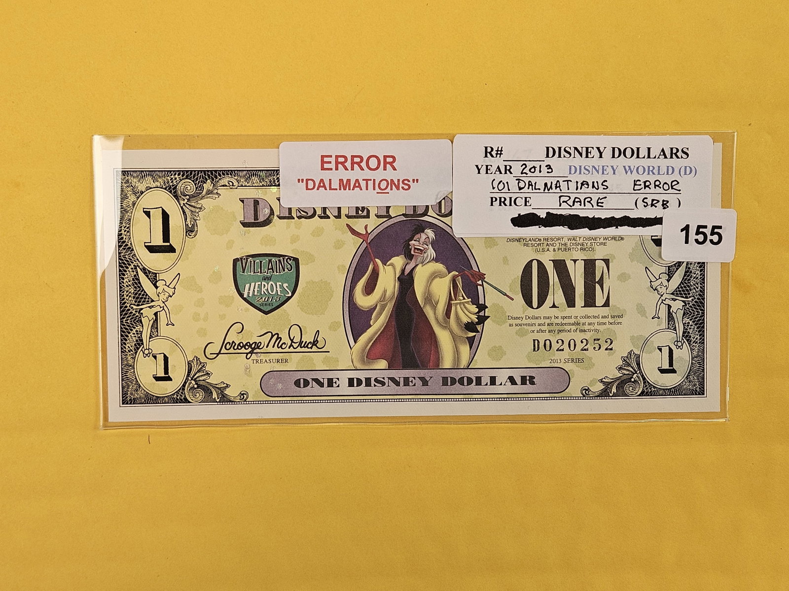 DISNEY DOLLAR!: ERROR! Crisp Uncirculated 2013 One Dollar. 101 Dalmations Spelling Error