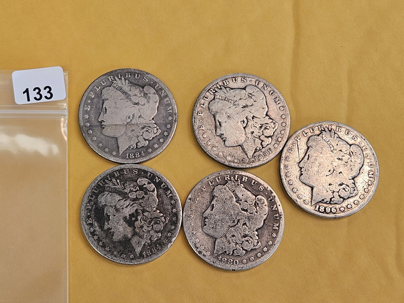 Five mixed Morgan Silver Dollars - 2