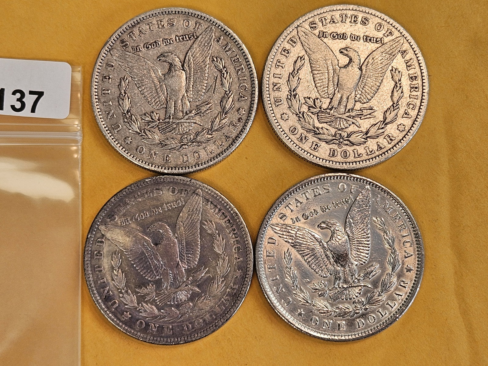 Four mixed Morgan Silver Dollars - 2