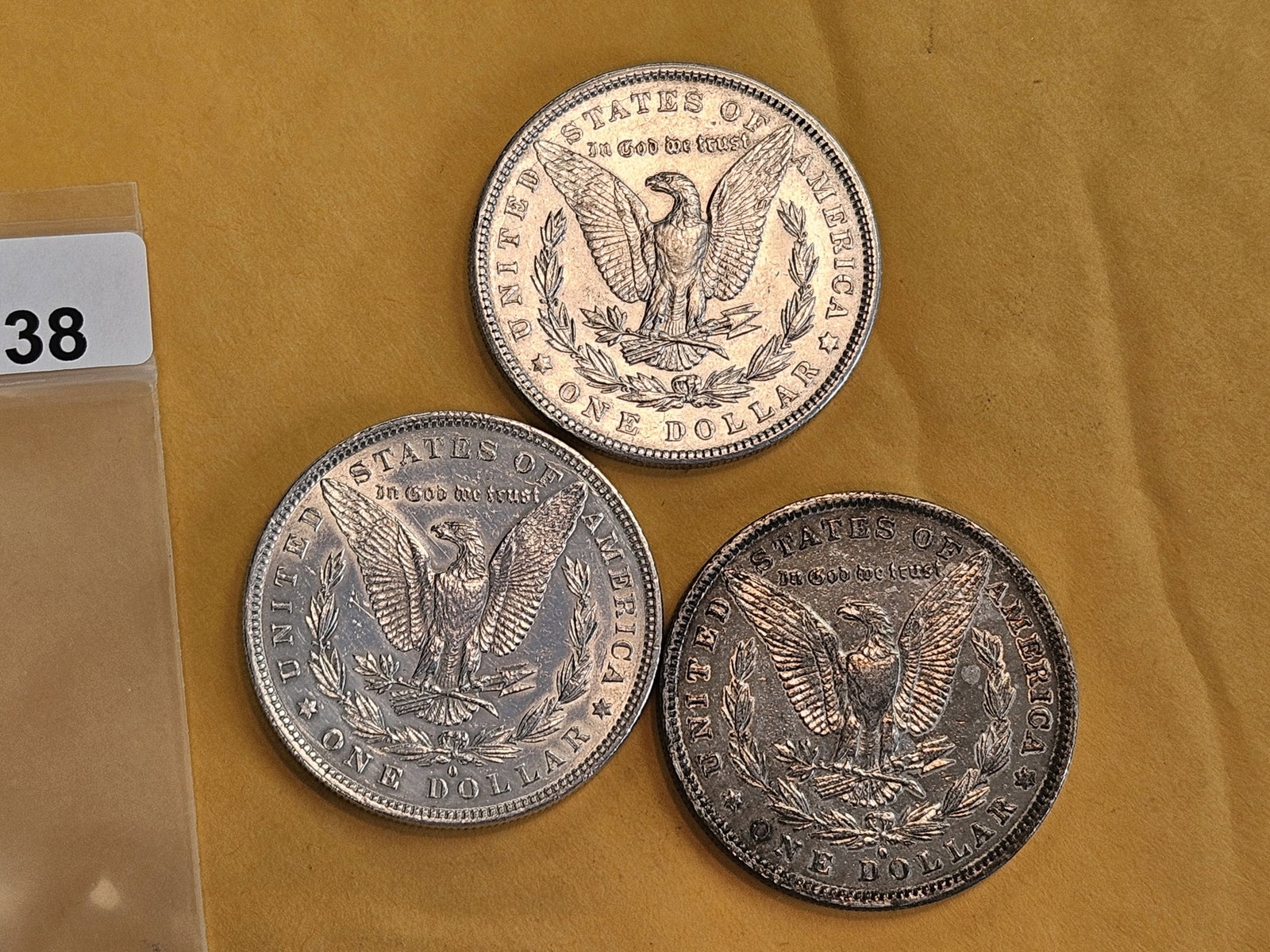Three mixed Morgan Silver Dollars - 3