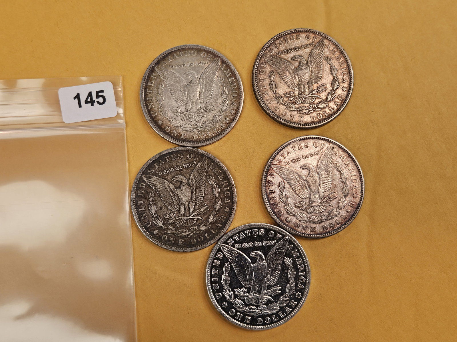 Five mixed Morgan Silver Dollars - 2