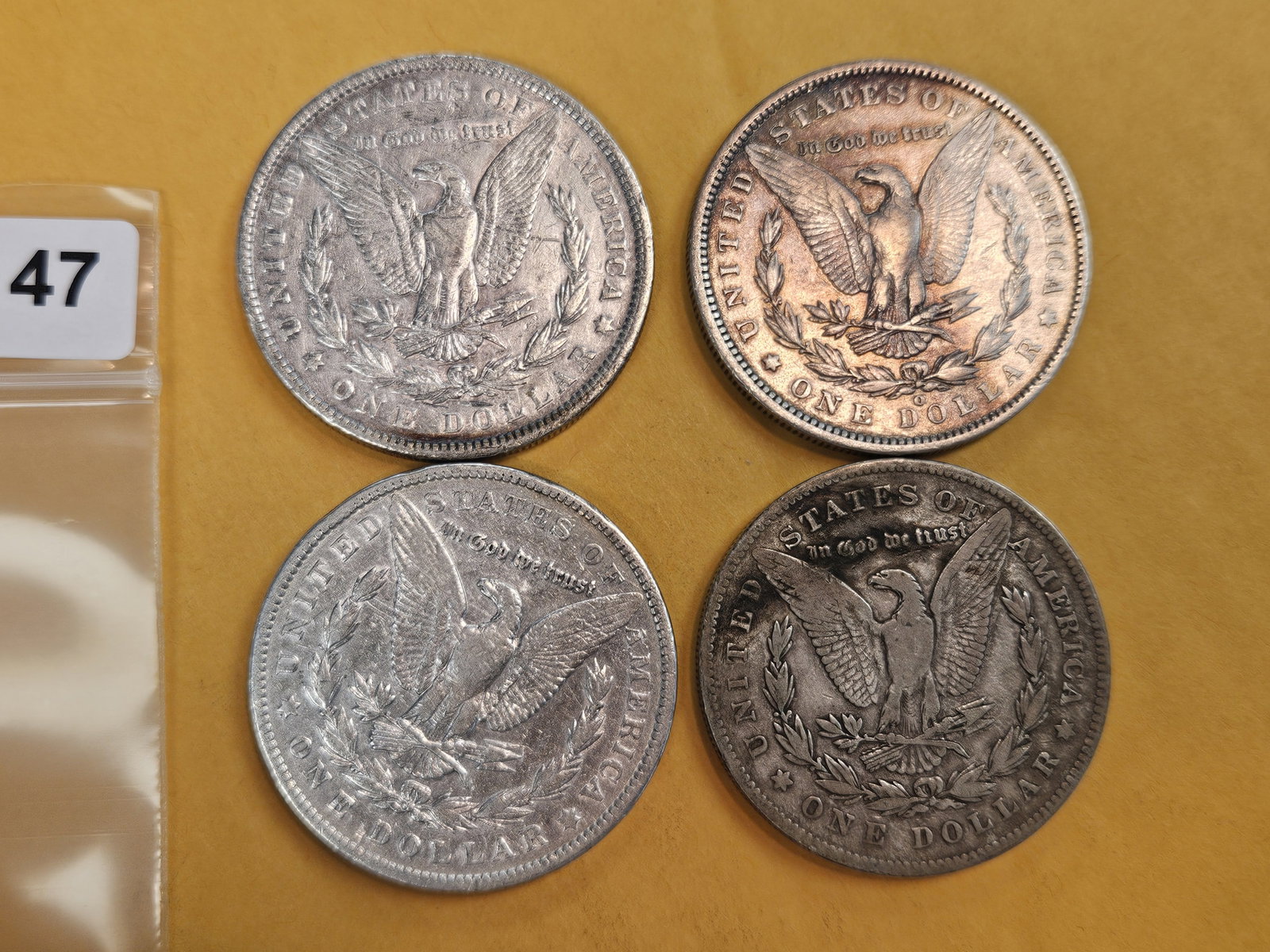 Four mixed Morgan Silver Dollars - 2