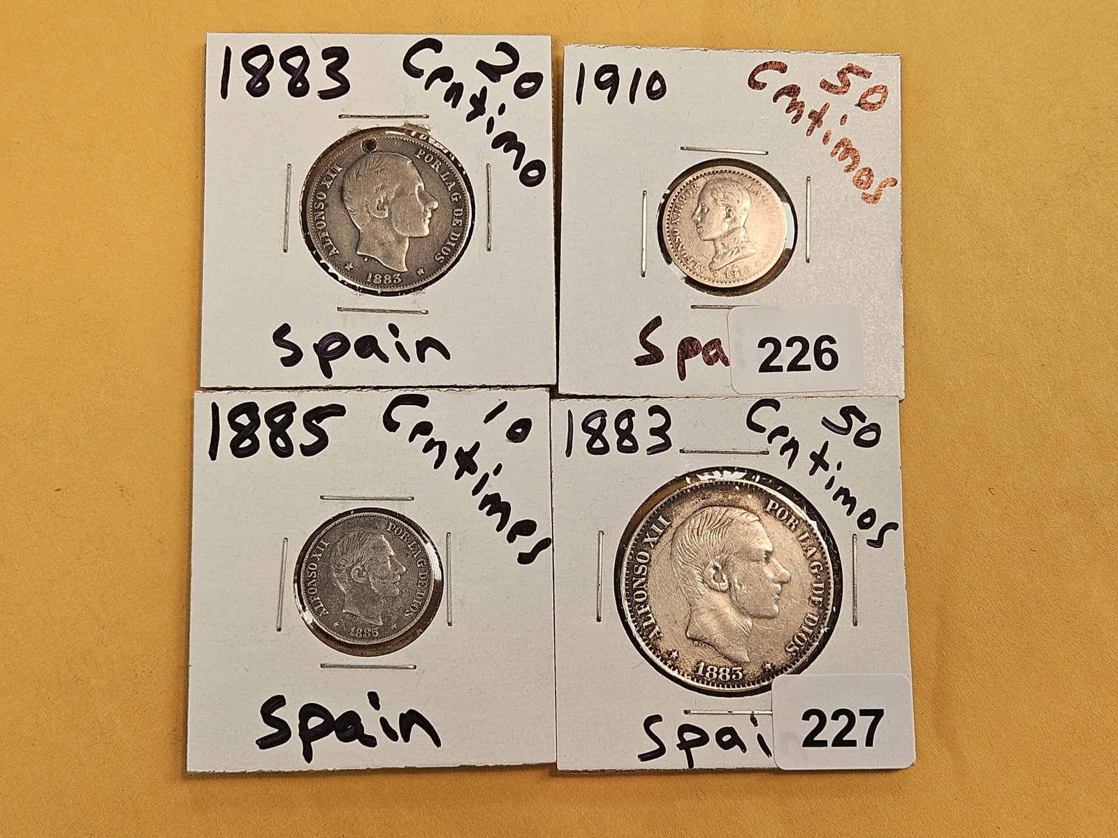 Four mixed Spanish coins - 2