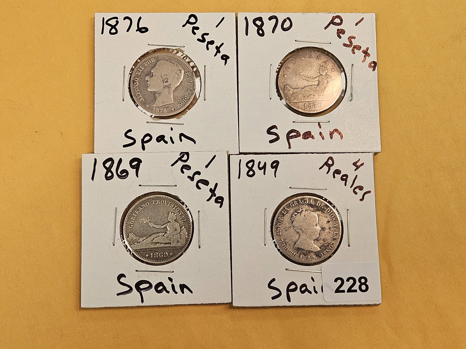 Four mixed Spanish coins - 2