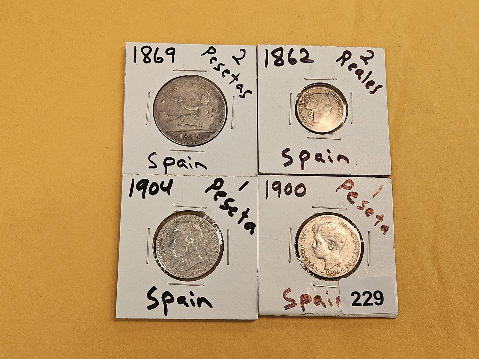Four mixed Spanish coins - 2