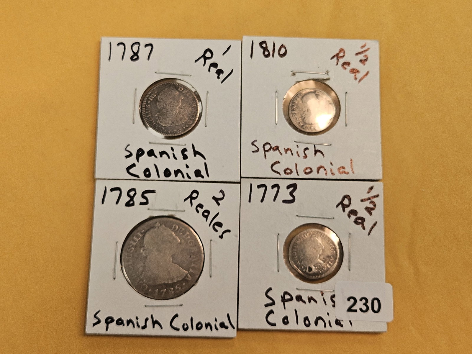 Four mixed Spanish coins - 2