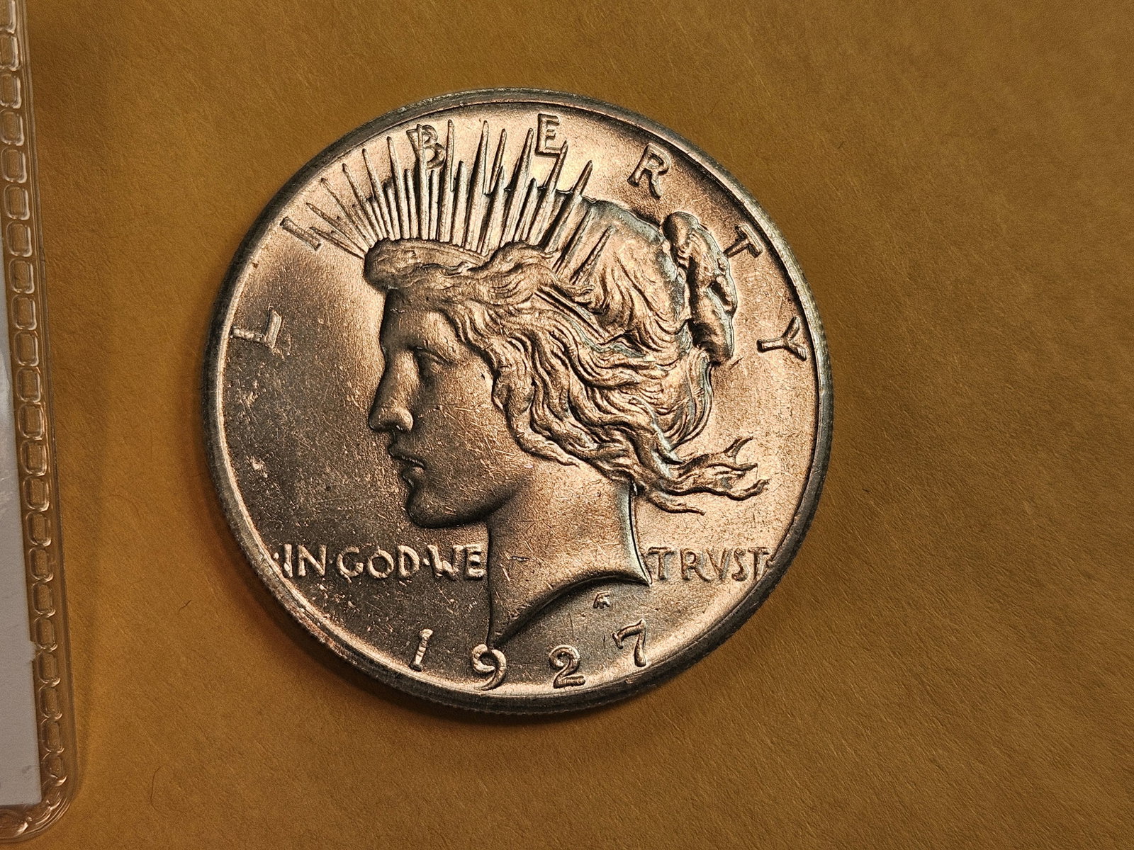 Better Grade 1927 Peace Silver Dollar in Choice Brilliant Uncirculated - 4