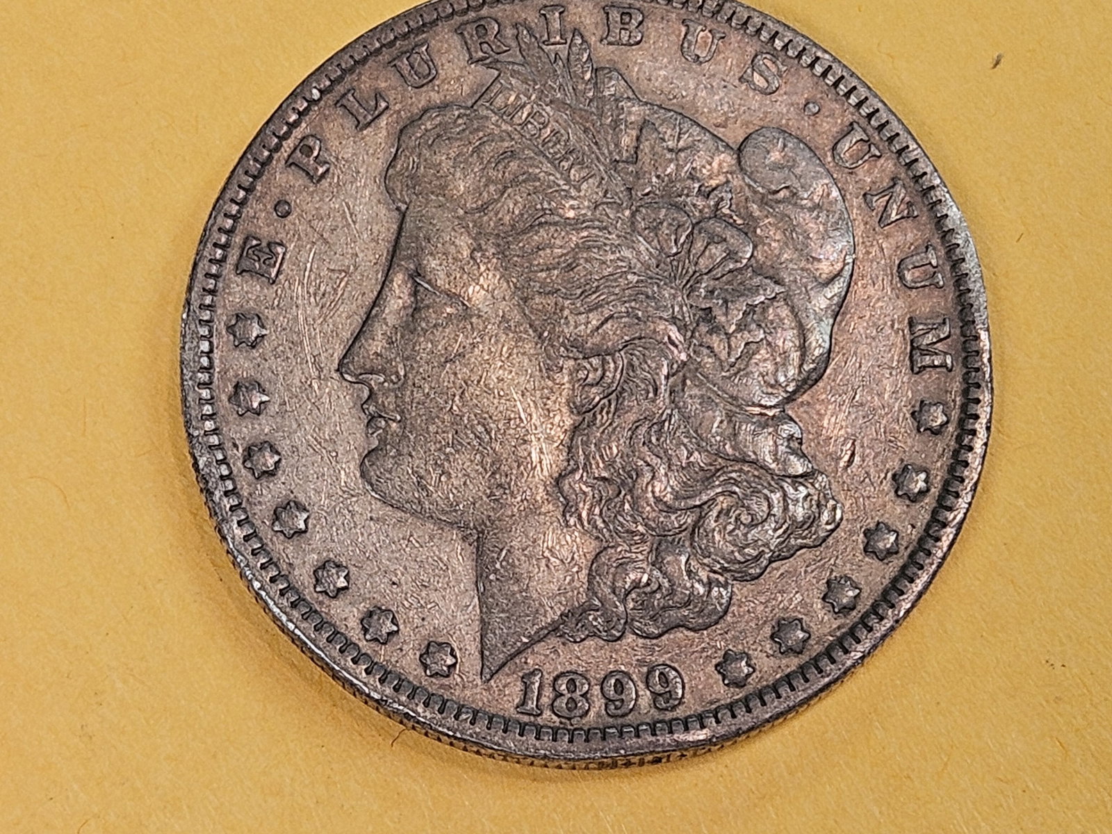 Better date 1899 Morgan silver Dollar: In Very Fine - 30