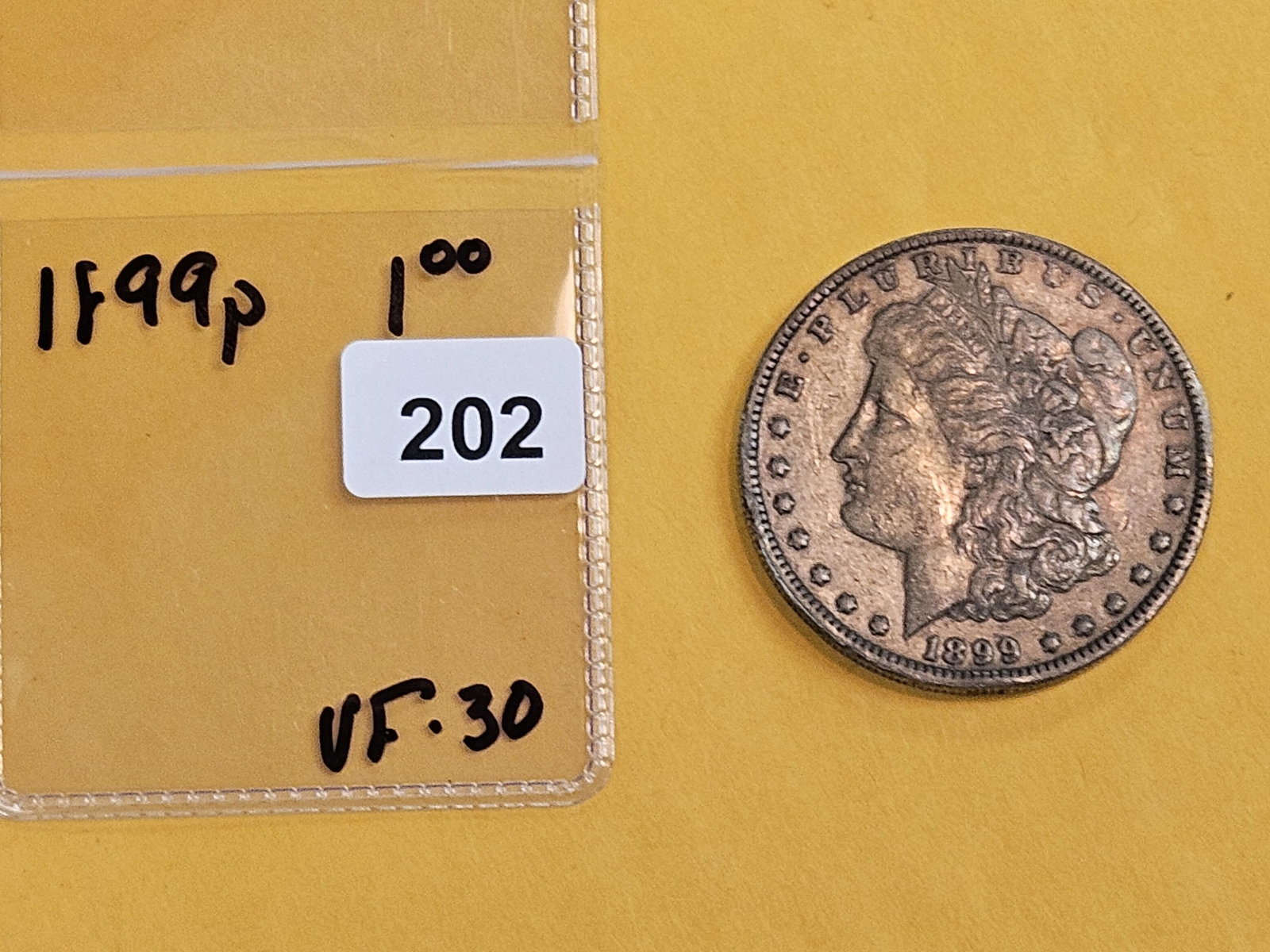 Better date 1899 Morgan silver Dollar - 2