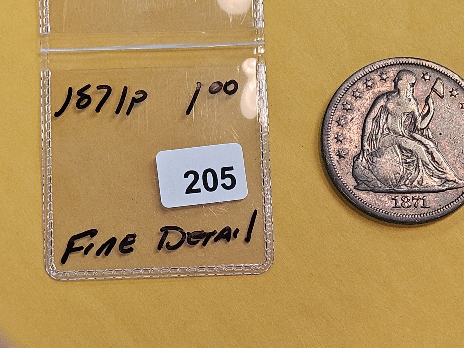 1871 Seated Liberty Dollar in Fine - details - 2