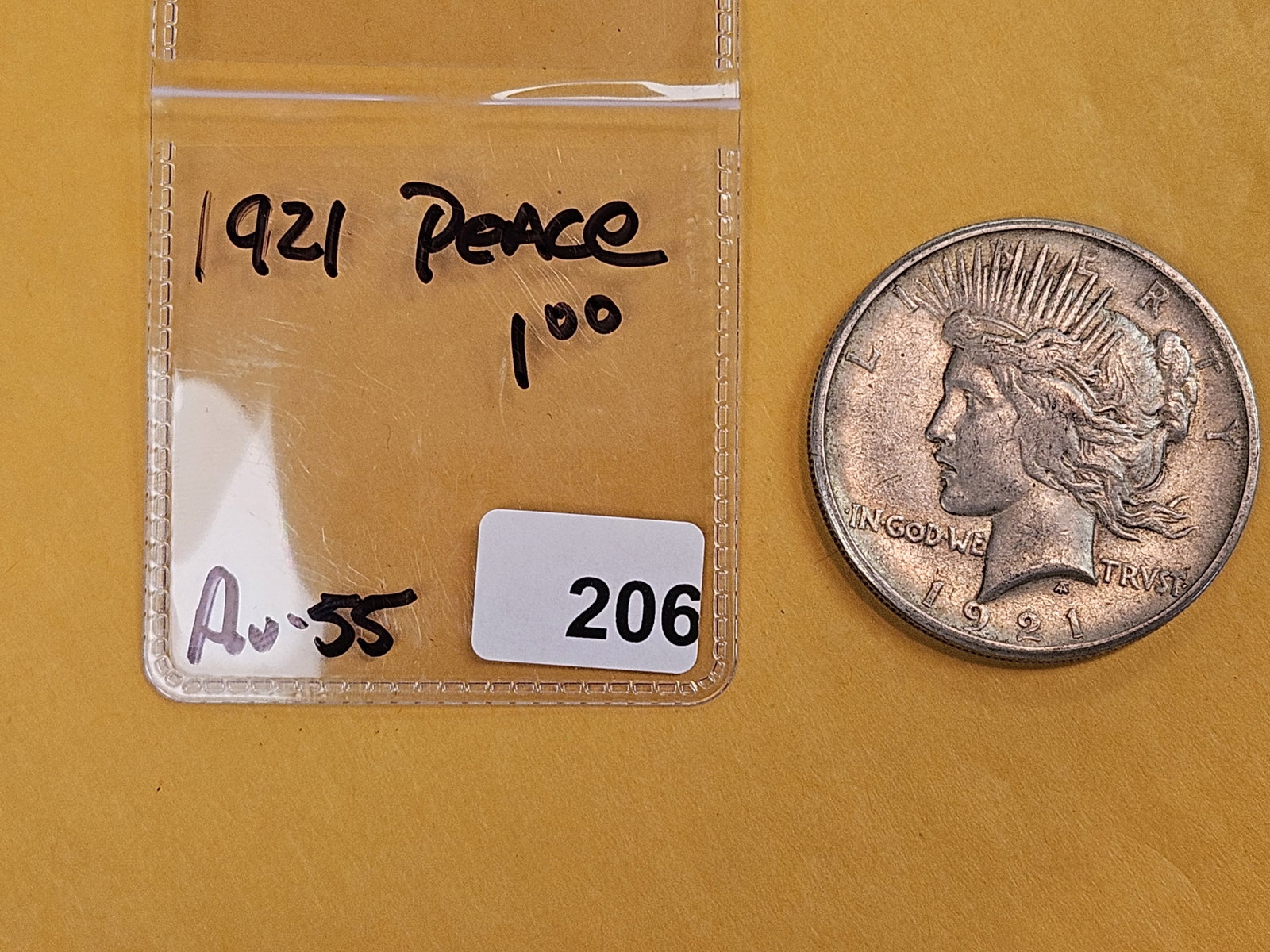 ** KEY DATE ** 1921 Peace Silver Dollar in About Uncirculated - 55 - 2