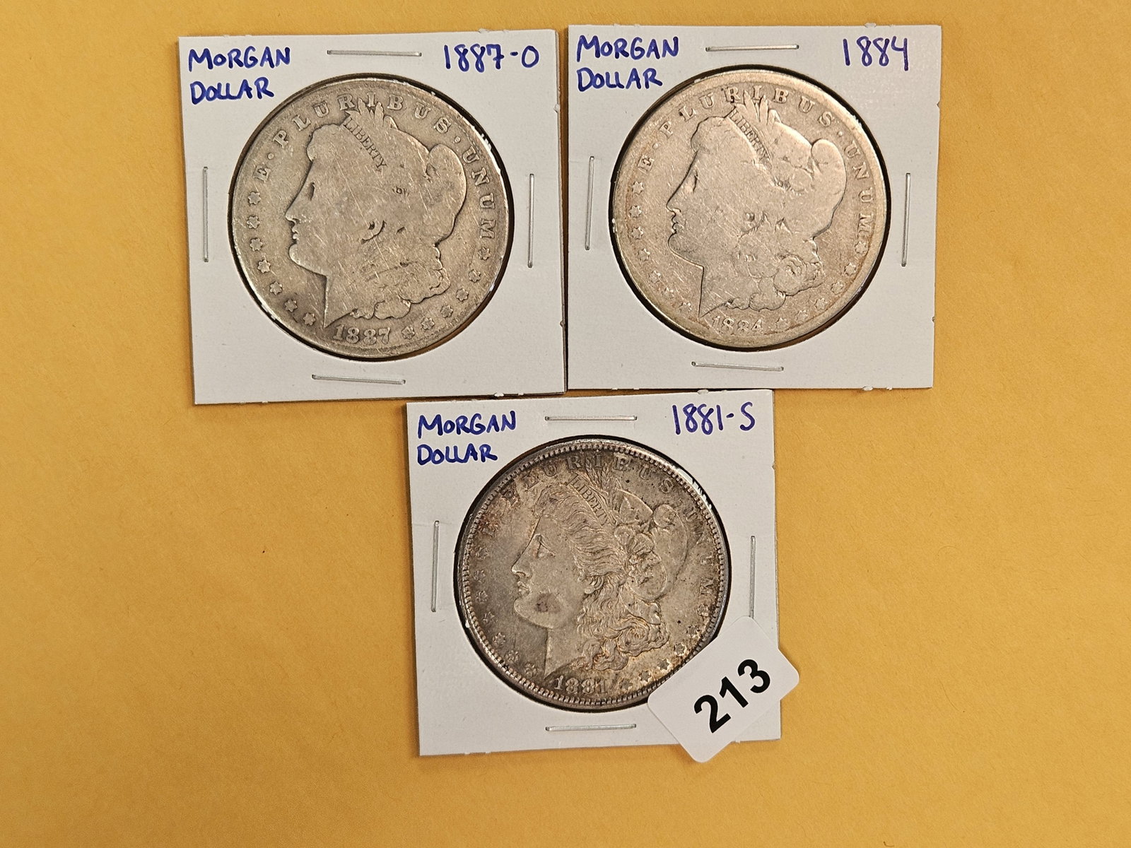Three Morgan Silver Dollars: Mixed