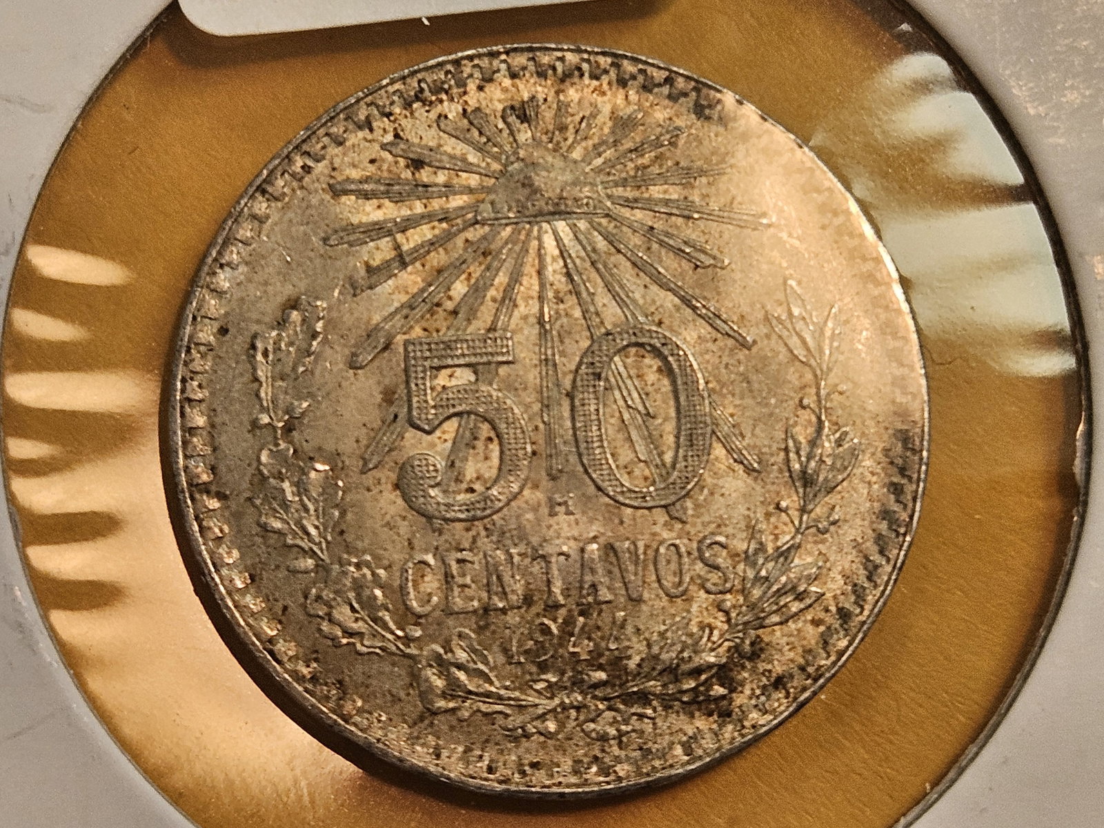 Bright Uncirculated 1944 Mexico silver 50 centavos: Toned