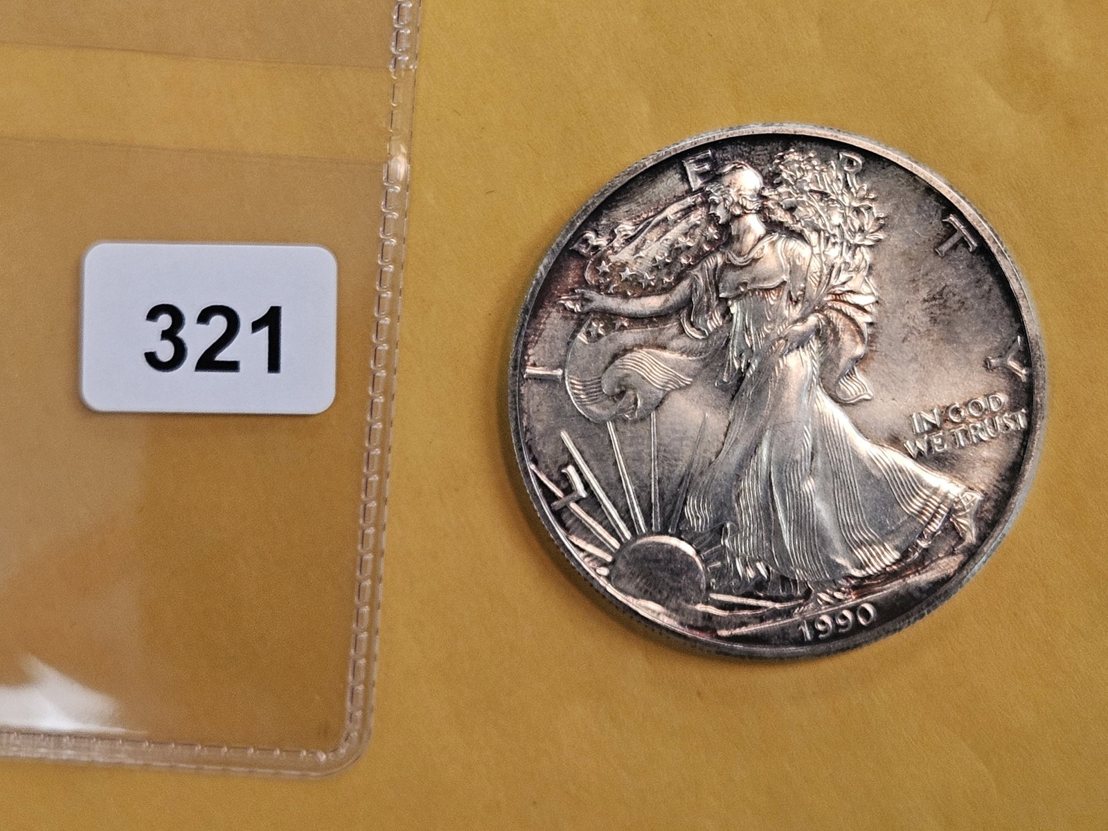 And last, but not least, a 1990 American Silver Eagle: Thanks all for another lovely auction! Have a great night, wonderful week and we'll see ya'll again next time!