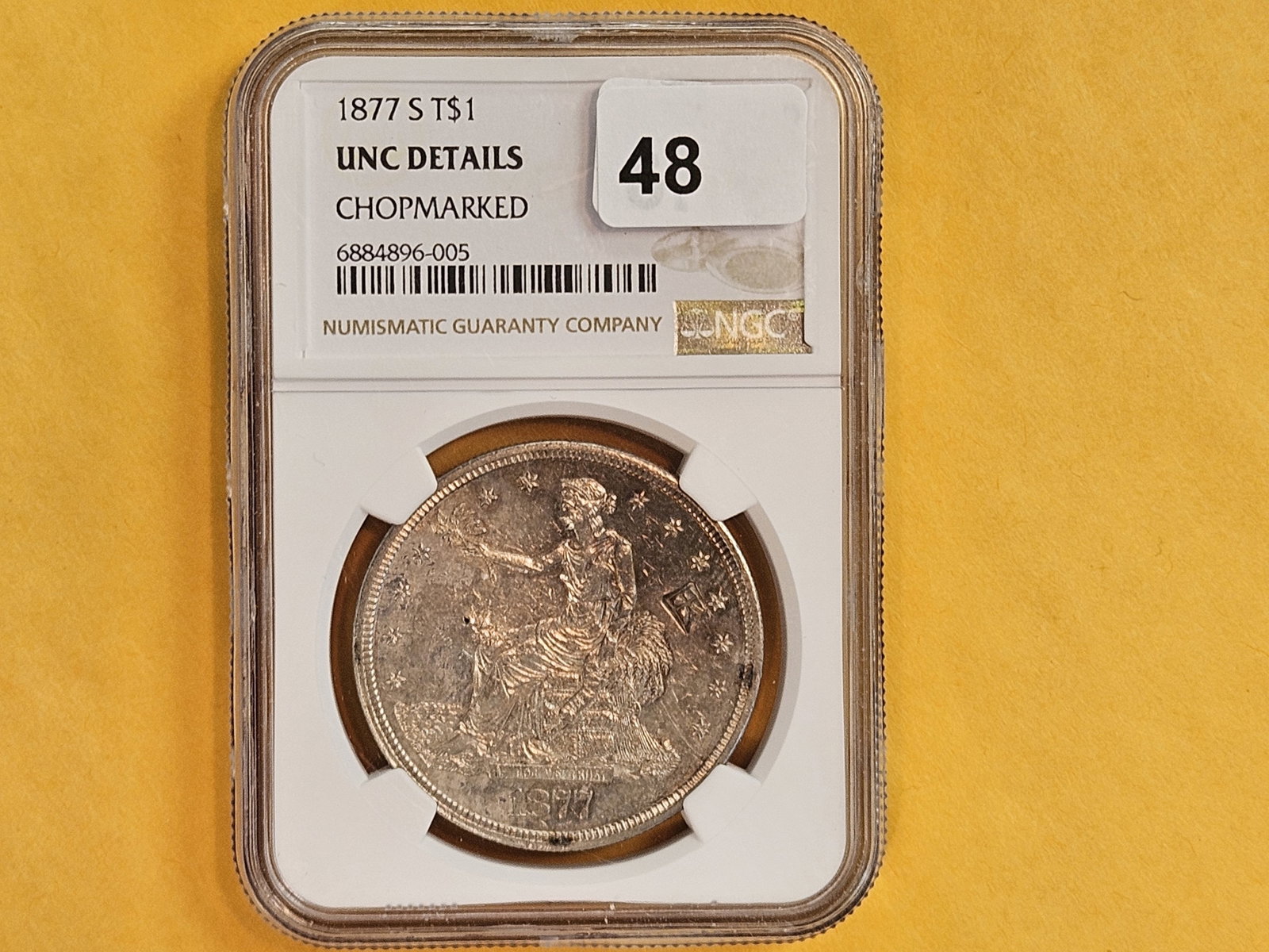 * NGC 1877-S Trade Silver Dollar in Brilliant Uncirculated - 2