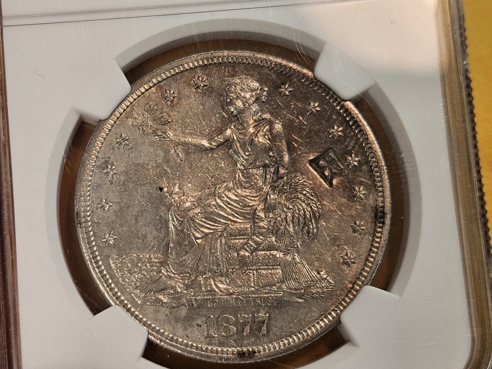 * NGC 1877-S Trade Silver Dollar in Brilliant Uncirculated - 7