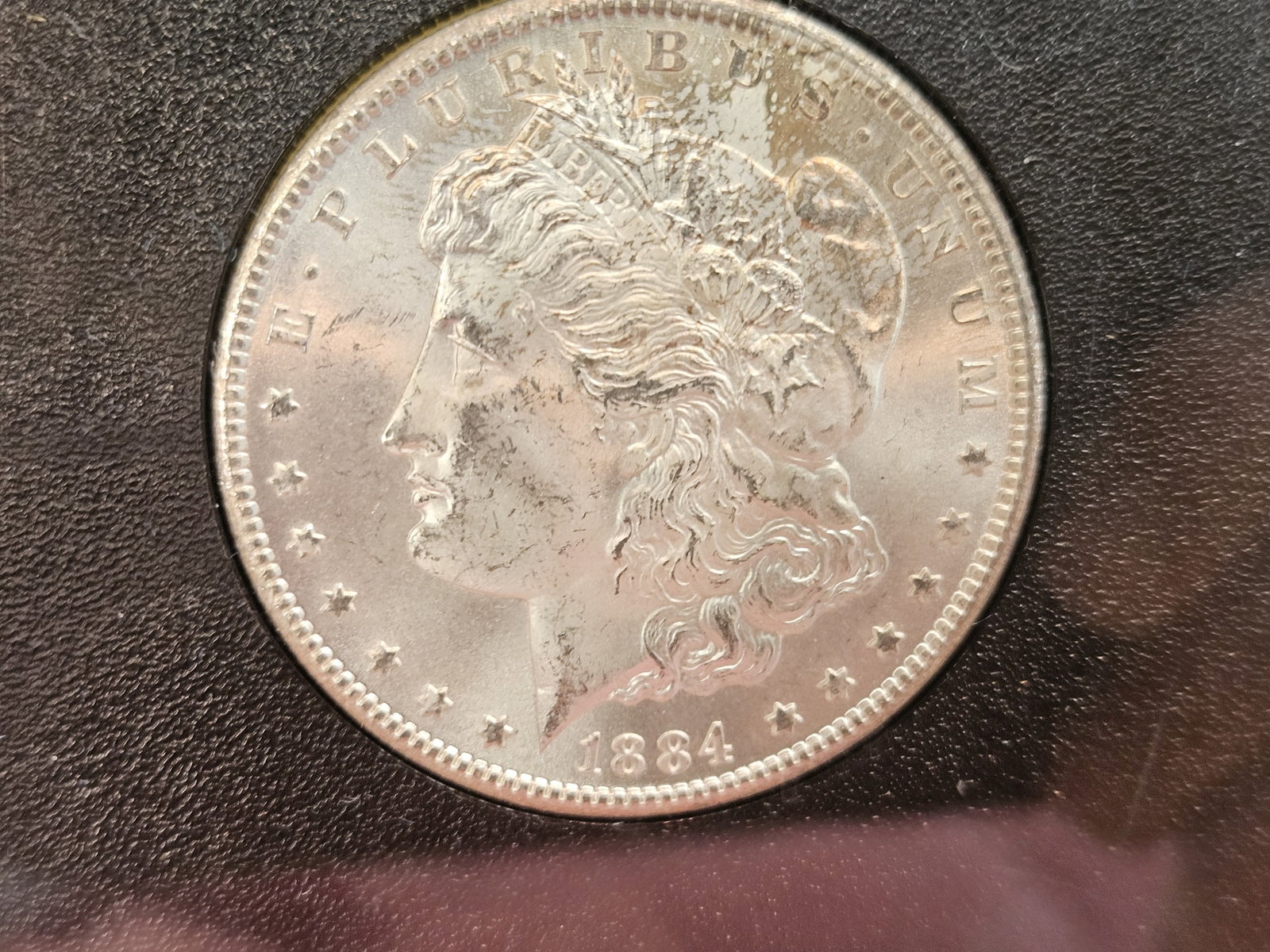 ** KEY DATE ** GSA 1884-CC Morgan Dollar in Very Choice Brilliant Uncirculated - 7