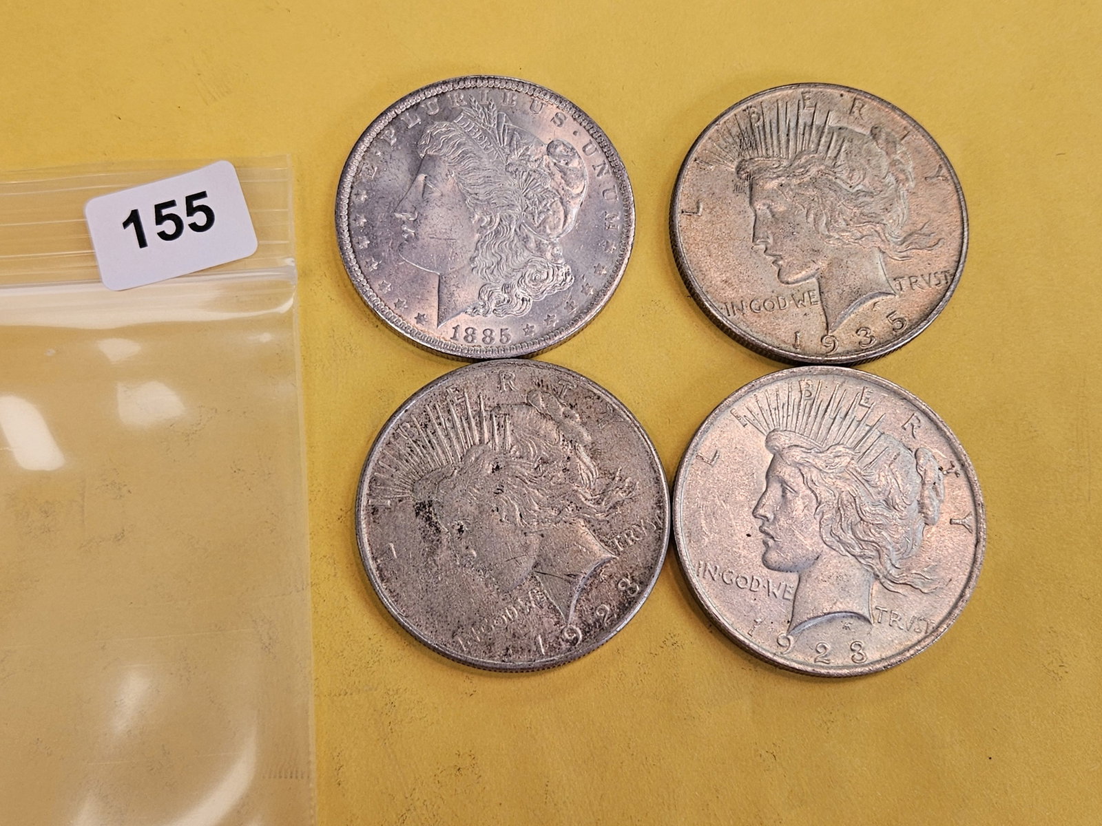 Four mixed About Uncirculated silver Dollars - 2