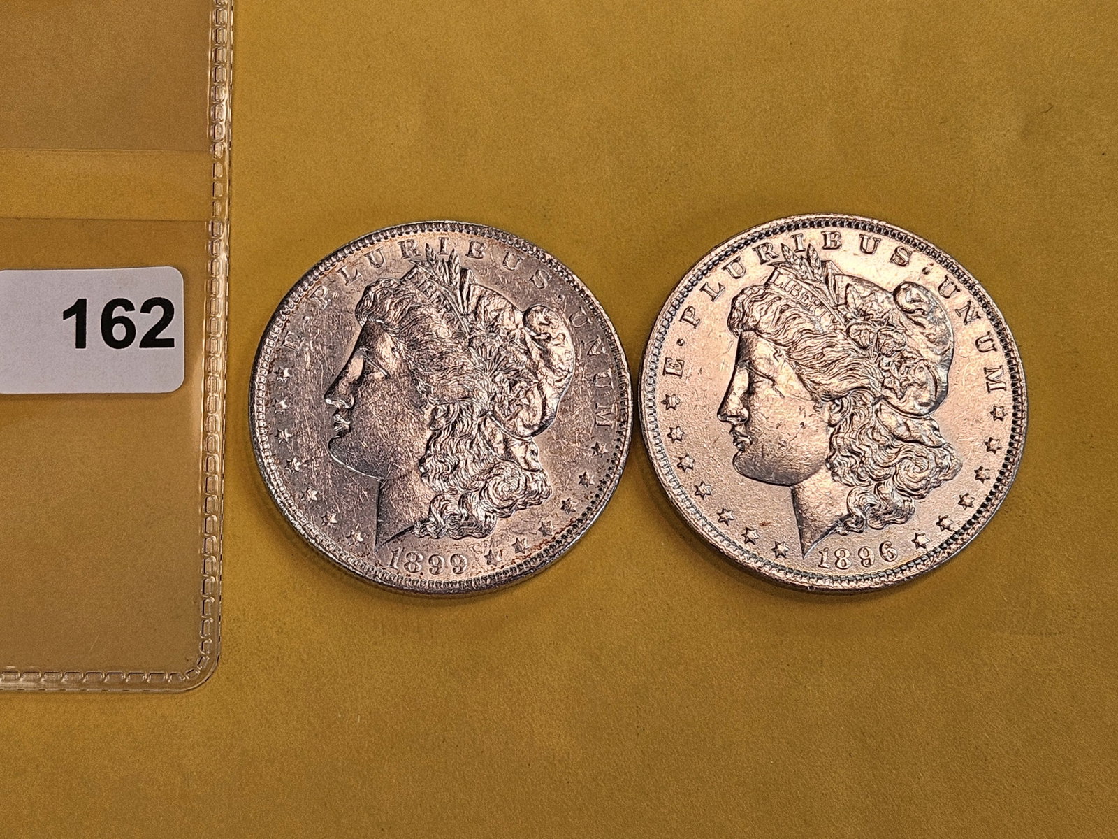 Two About Uncirculated Plus Morgan silver Dollars - 2