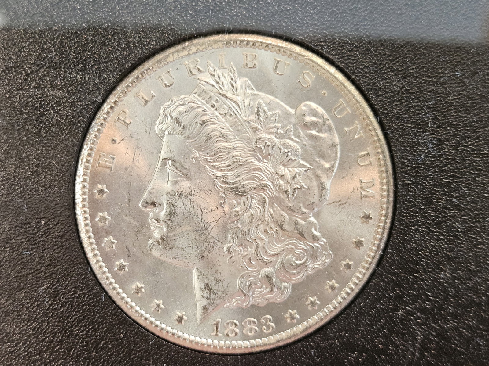 ** KEY DATE ** GSA 1883-CC Morgan Dollar in Choice Brilliant Uncirculated Plus - 5