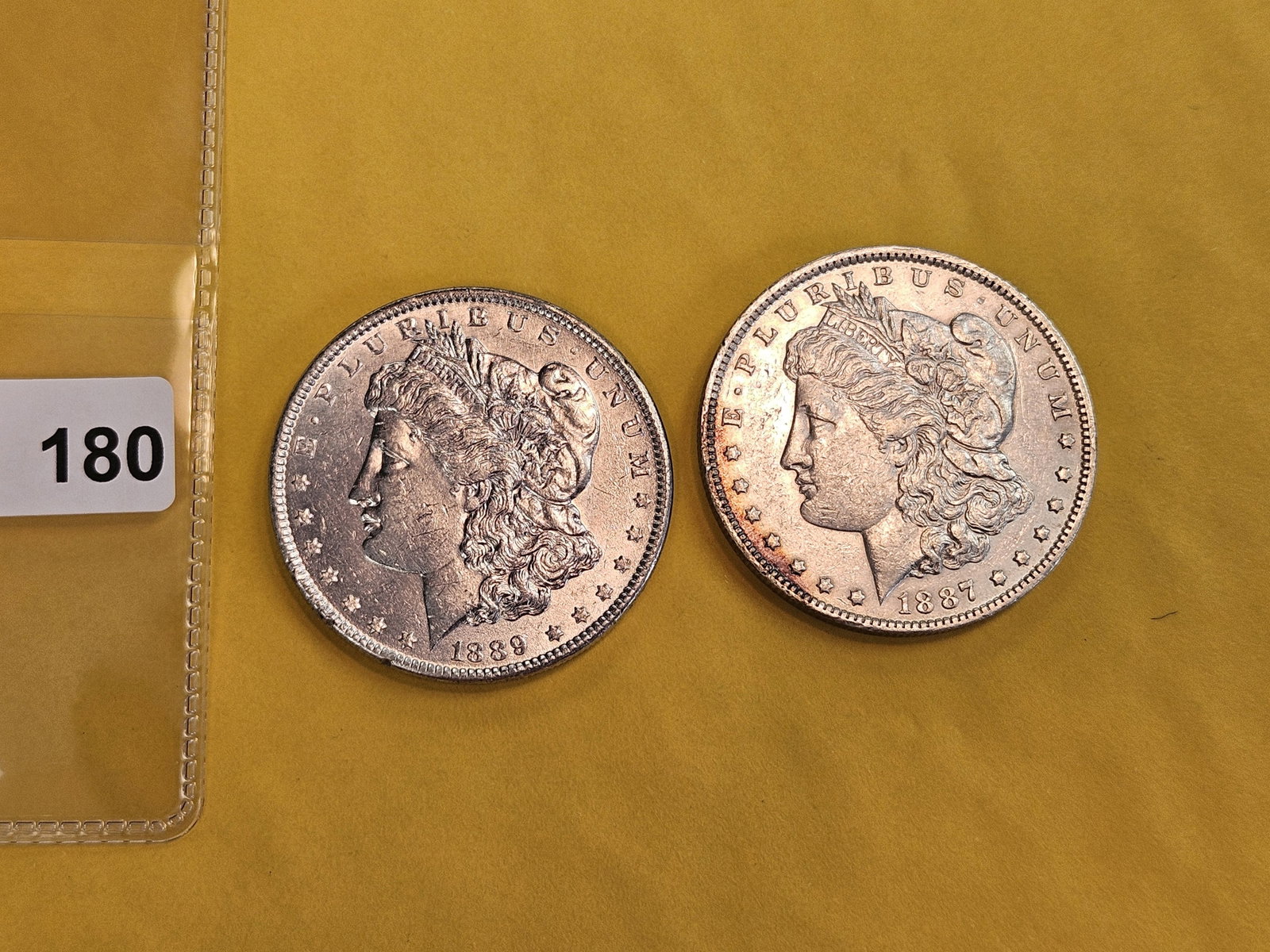 Two About Uncirculated Plus Morgan silver Dollars - 2