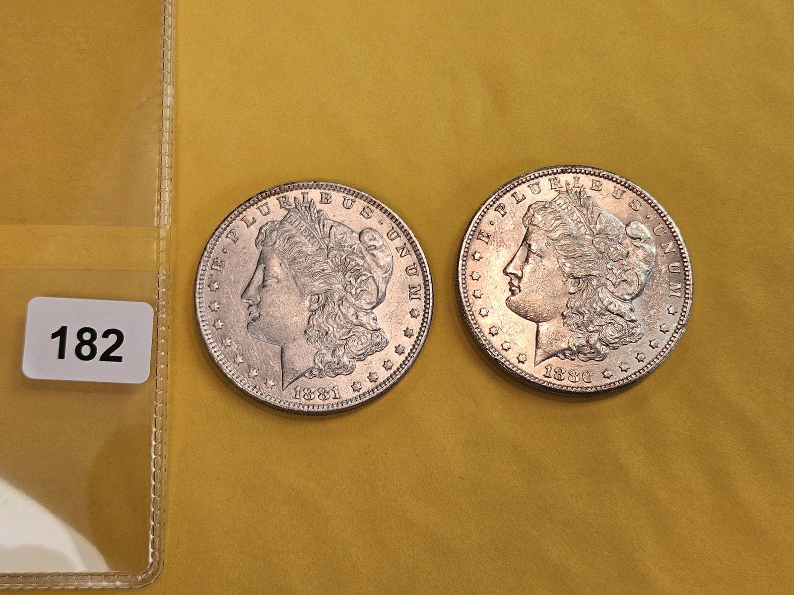 Two About Uncirculated Plus Morgan silver Dollars - 2
