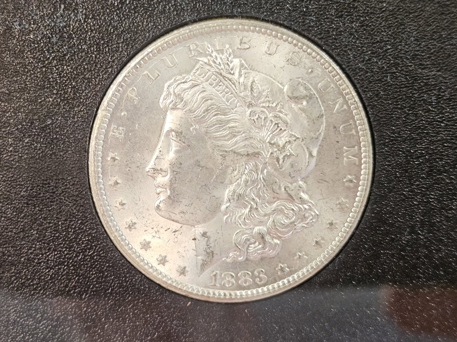 ** KEY DATE ** GSA 1883-CC Morgan Dollar in Choice Brilliant Uncirculated Plus - 5
