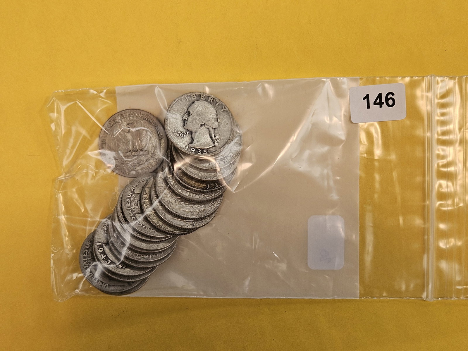 Twenty mixed silver Washington Quarters: Mixed dates and grades