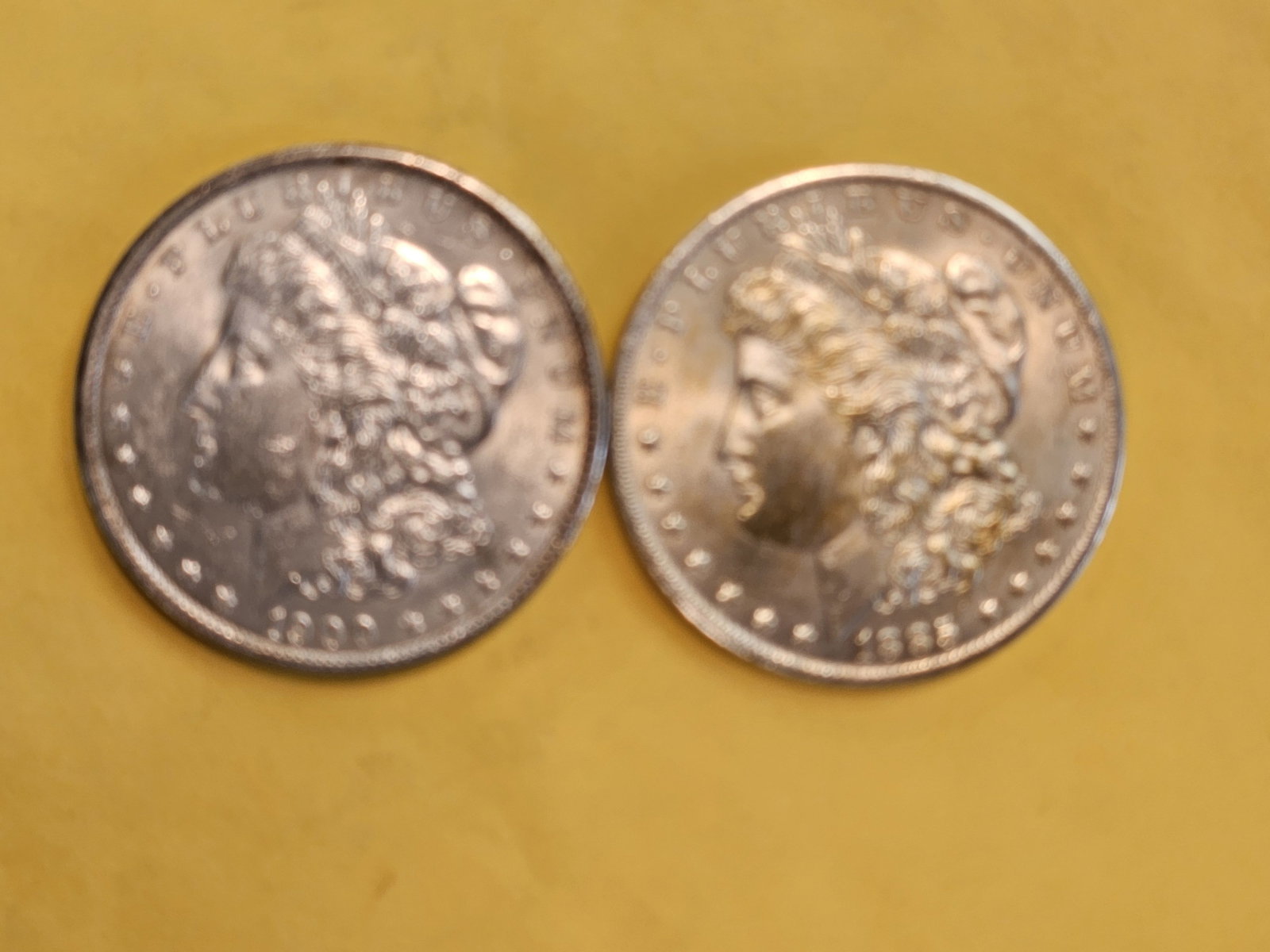 Two Brilliant About Uncirculated Morgan Silver Dollars: Mixed.