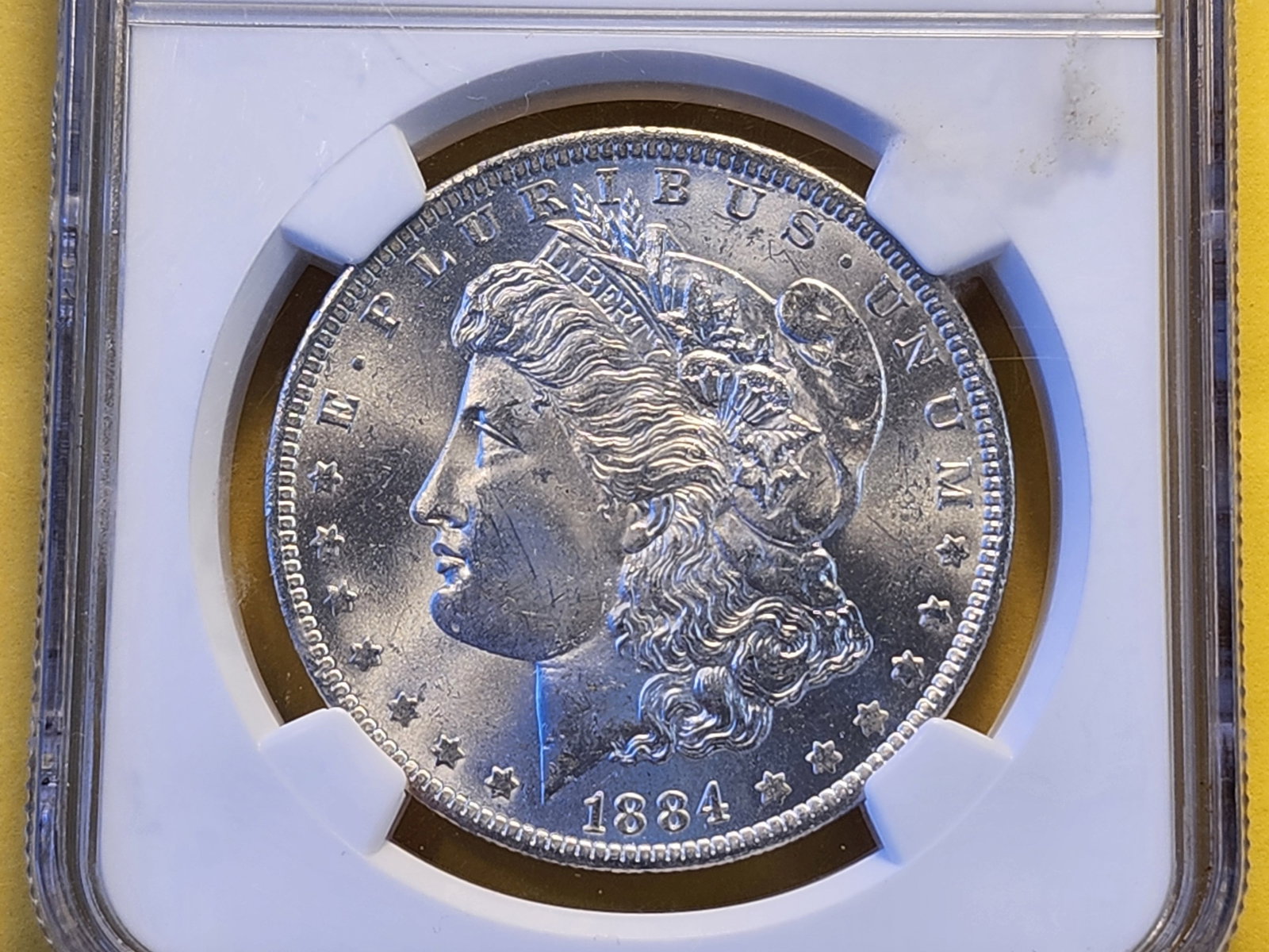 NGC 1884-O Morgan Dollar in Mint State 63: Choice