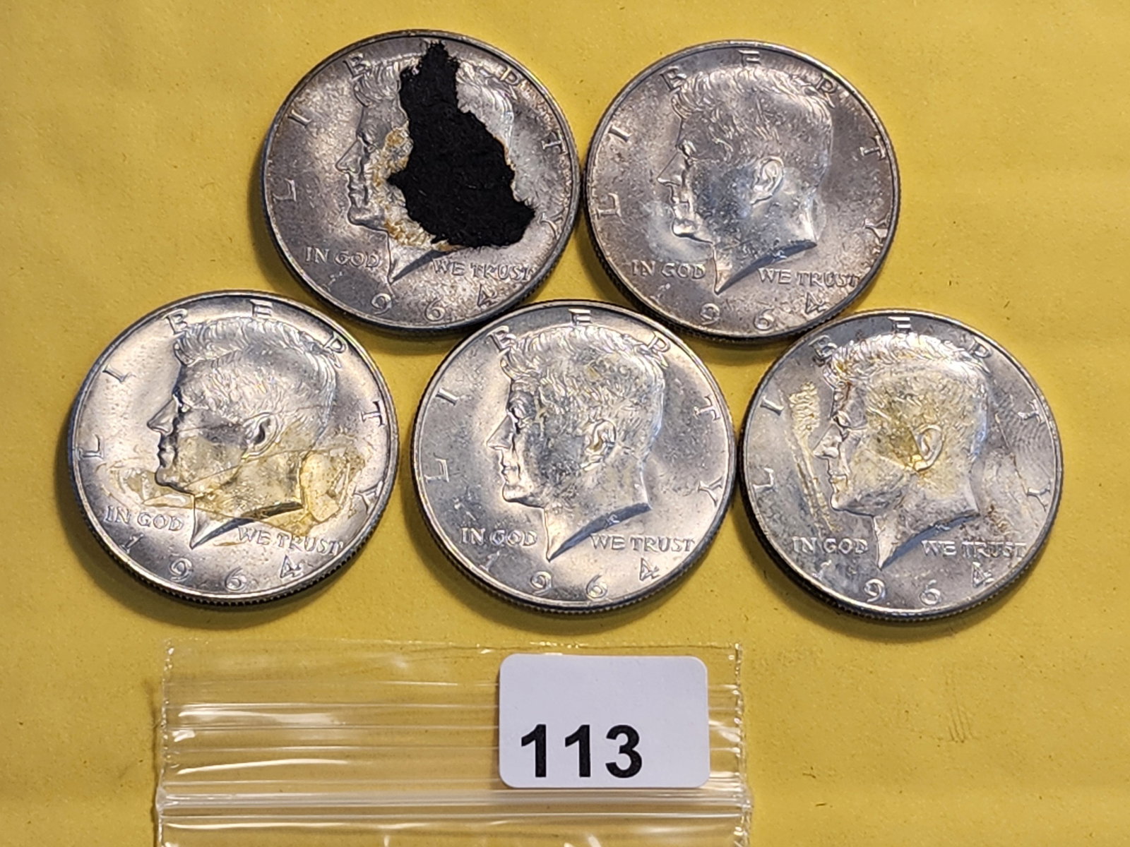 Five Kennedy Silver Half Dollars: All 1964. Has glue residue and paper