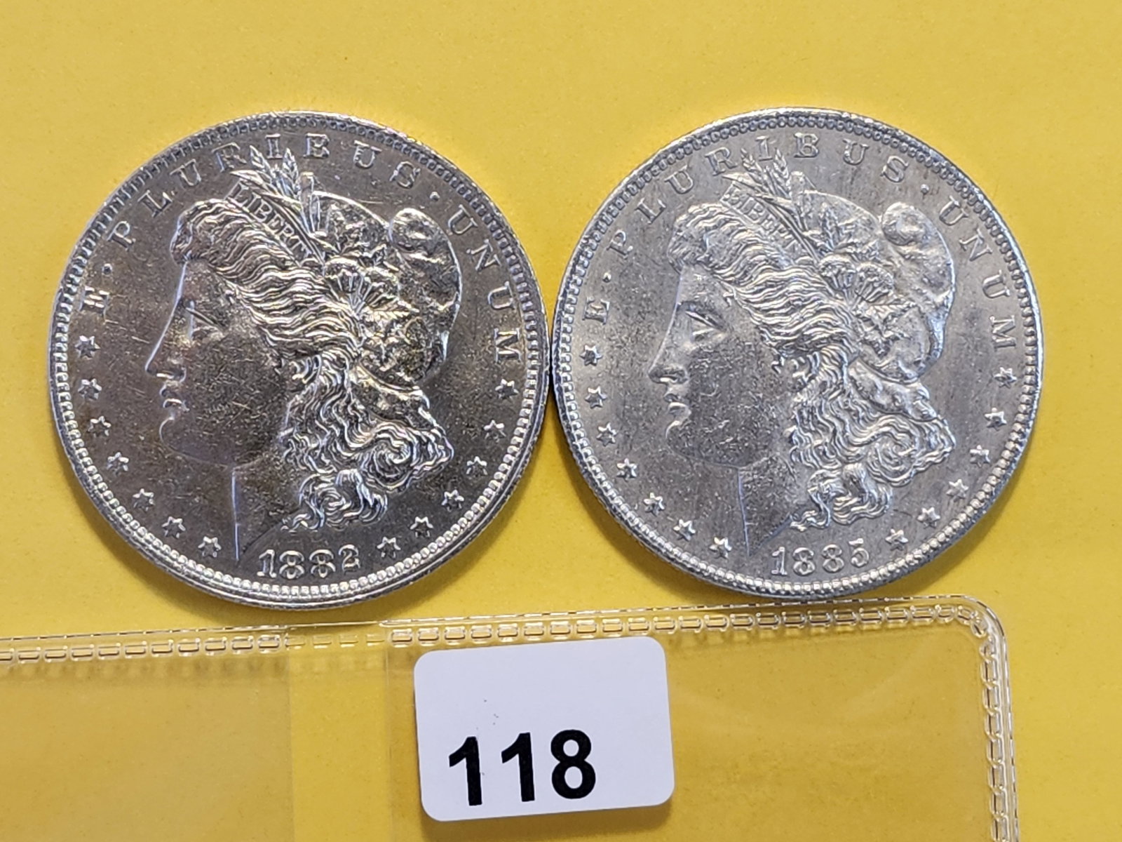Two Brilliant About Uncirculated Plus Morgan Silver Dollars: 1882-O and 1885-O