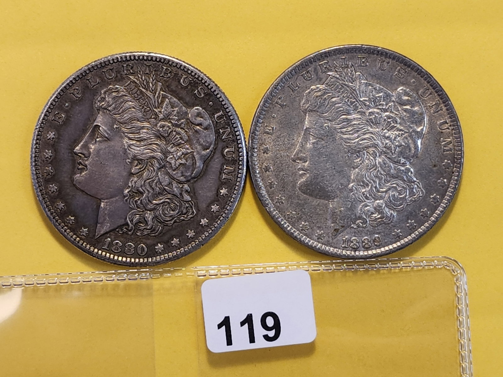Two About Uncirculated Plus Morgan Silver Dollars: 1880-S and 1889