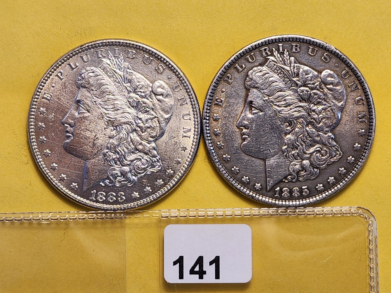 Two Brilliant About Uncirculated Plus Morgan Silver Dollars: 1883 and 1885