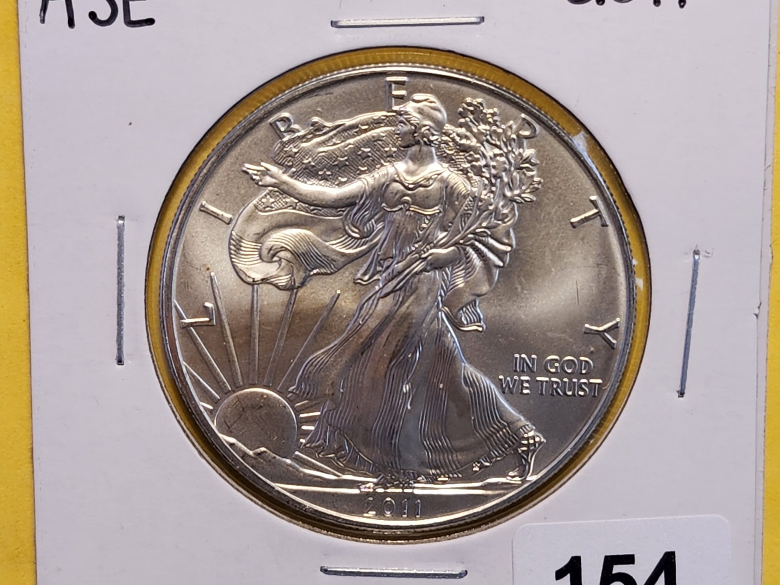 GEM Brilliant Uncirculated 2011 American Silver Eagle: Minimal toning