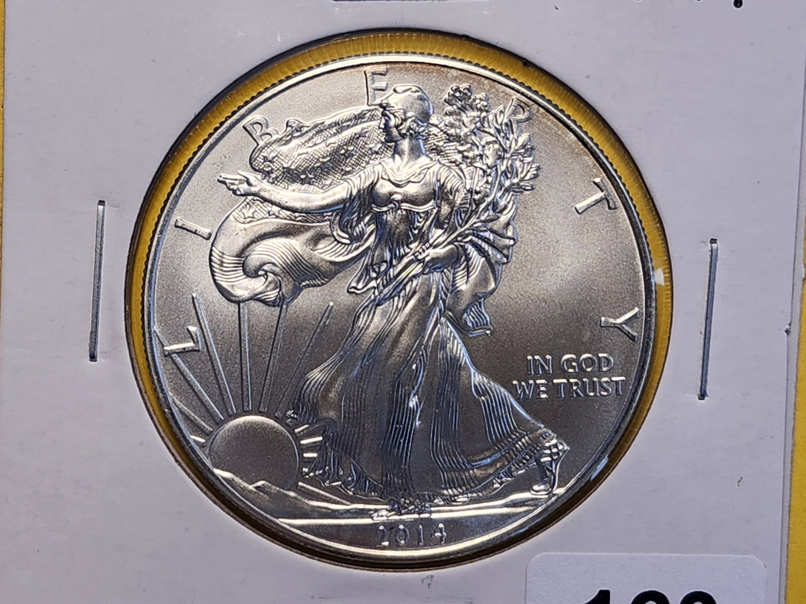 GEM Brilliant Uncirculated 2014 American Silver Eagle: Lightly toned