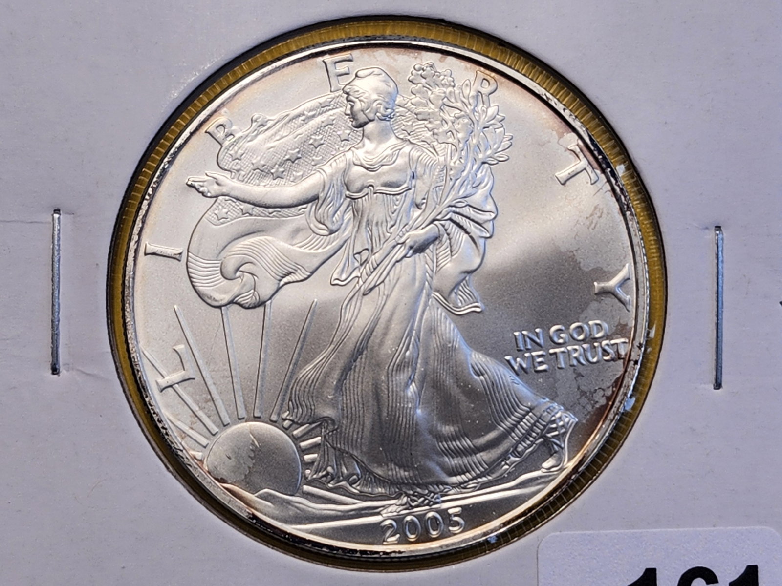 GEM Brilliant Uncirculated 2005 American Silver Eagle: Minimal toning