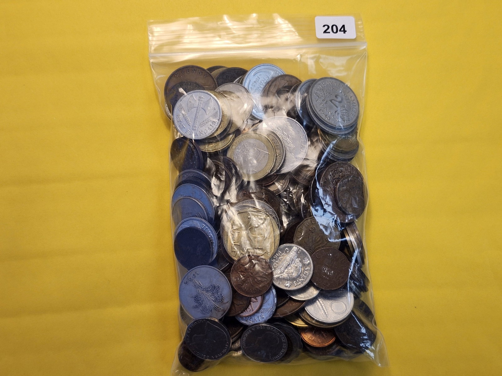 ONE and ONE-HALF Pound of Mixed World Coins: From Dealer. Unsearched by us