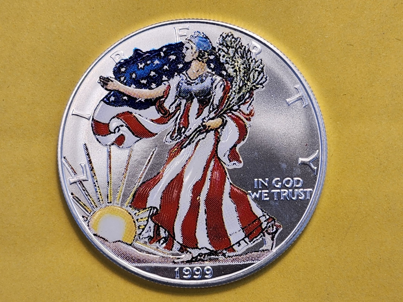 And last but not least, a 1999 Brilliant Uncirculated Colorized ASE: Thanks all for another great auction! Have a lovely night, wonderful week and we'll see y'all again next time!