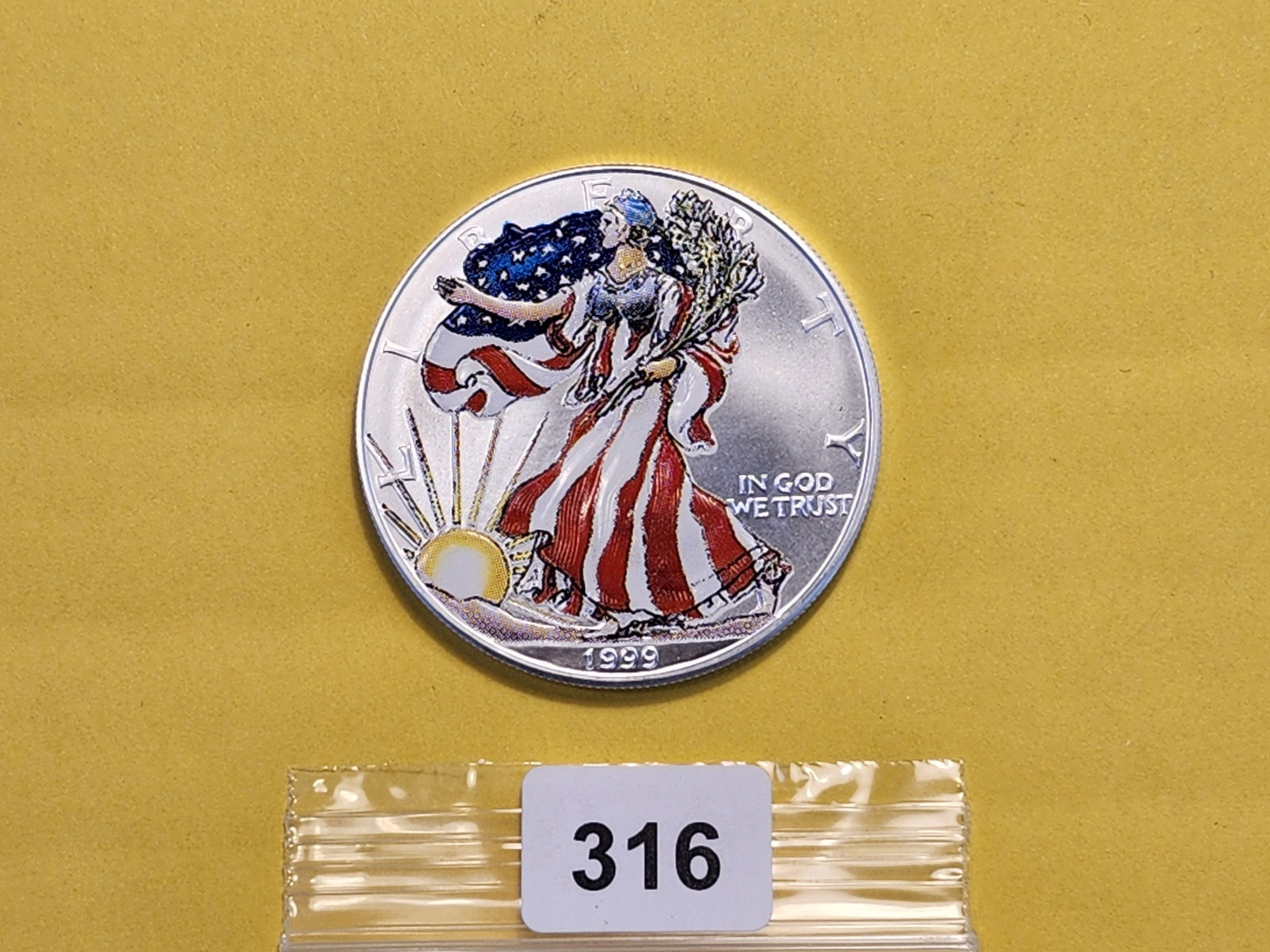 And last but not least, a 1999 Brilliant Uncirculated Colorized ASE - 2