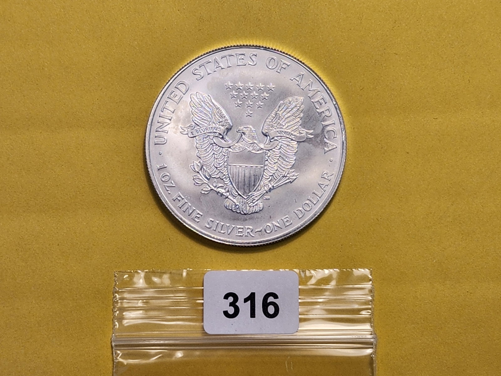 And last but not least, a 1999 Brilliant Uncirculated Colorized ASE - 3