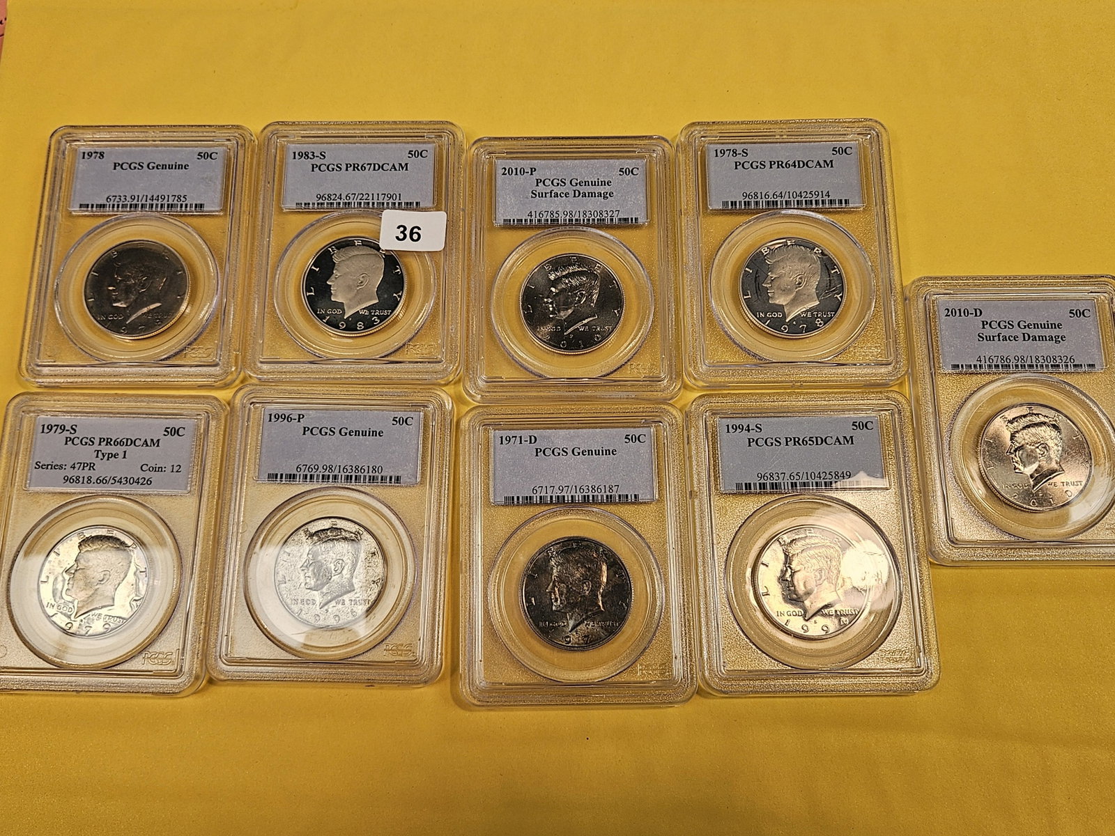 Nine mixed, PCGS-graded, Kennedy half Dollars - 2